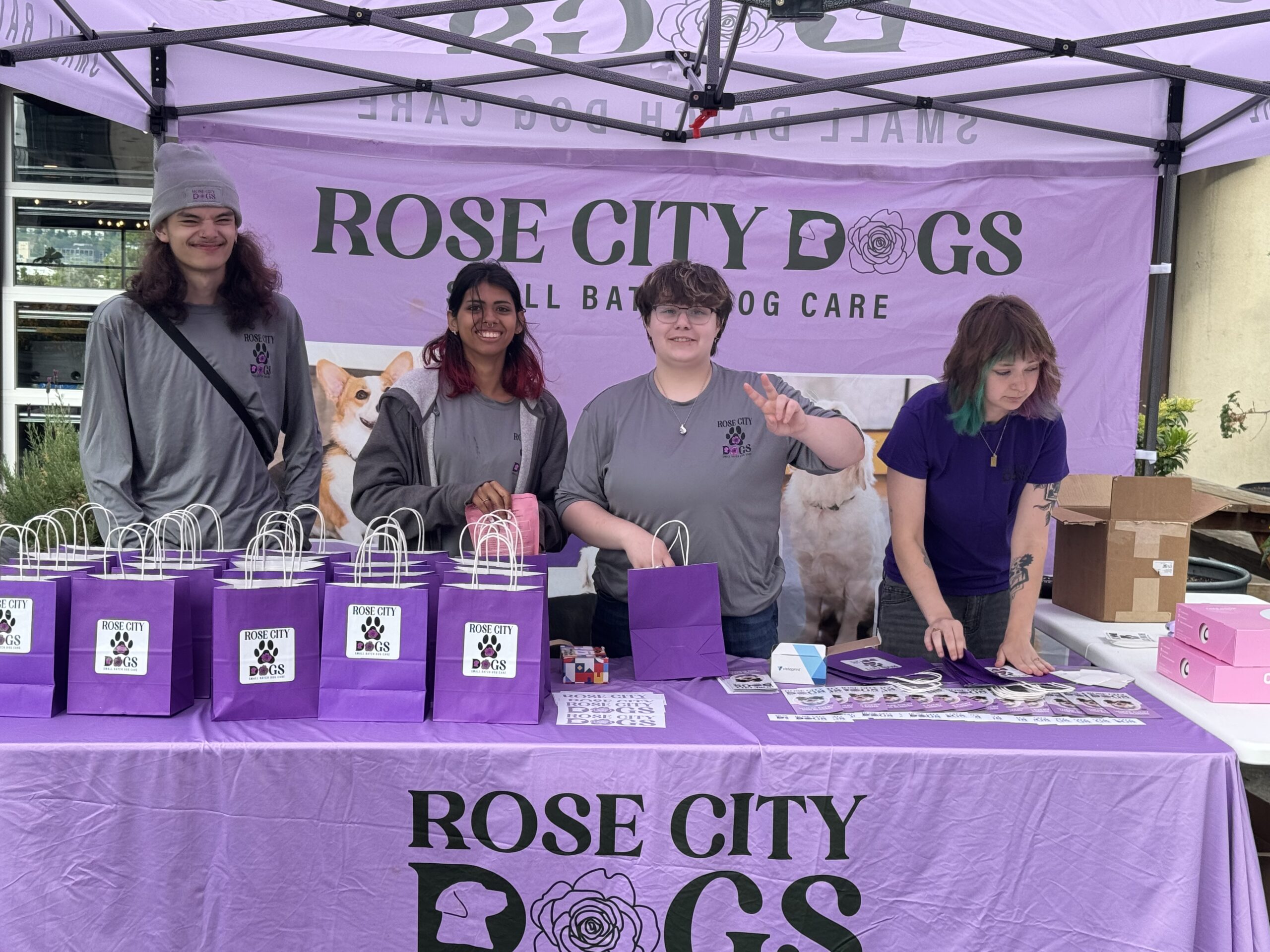 Rose City Dogs team at event booth